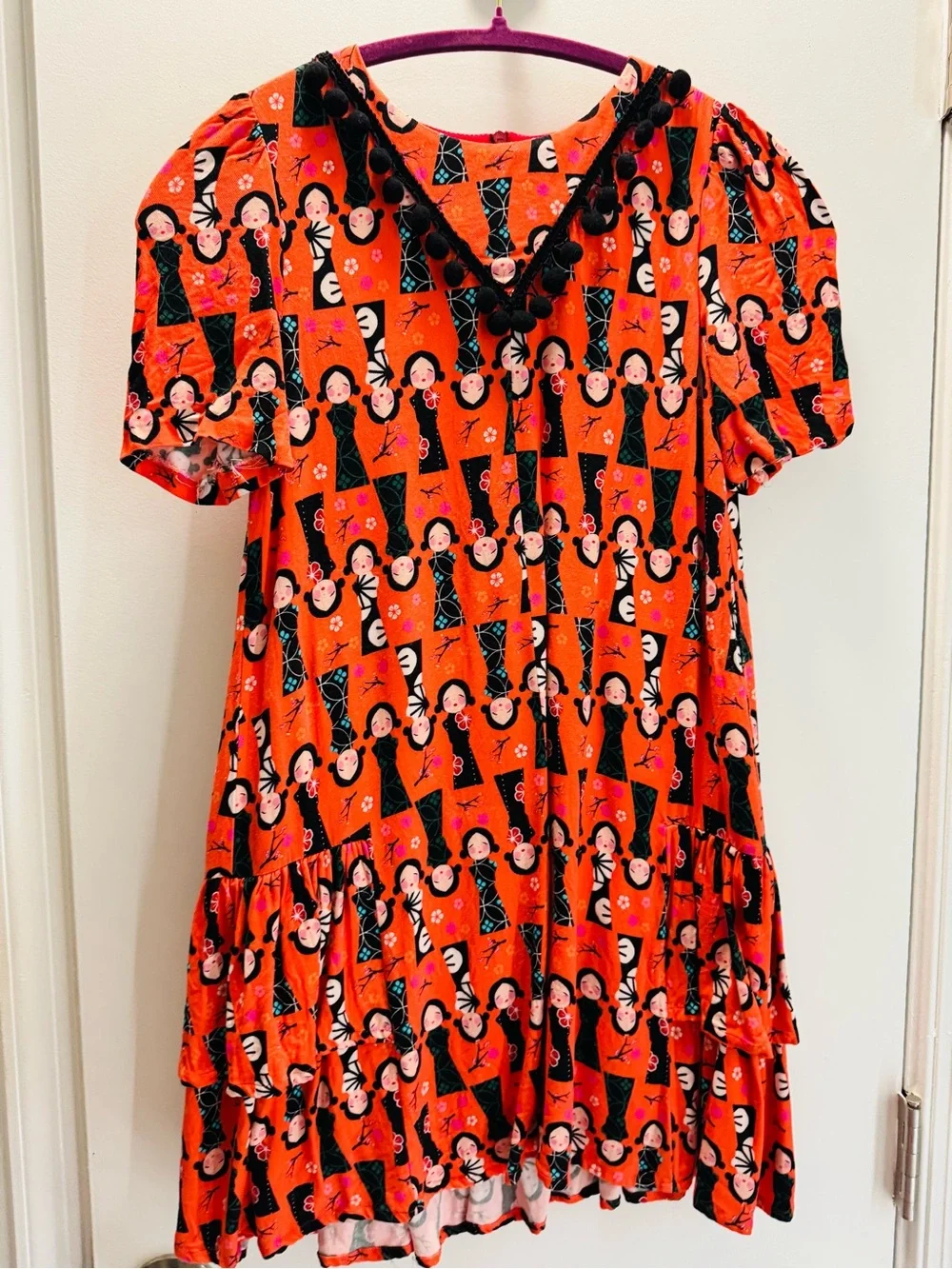 Girls' Orange Printed Party Dress with Black Trim